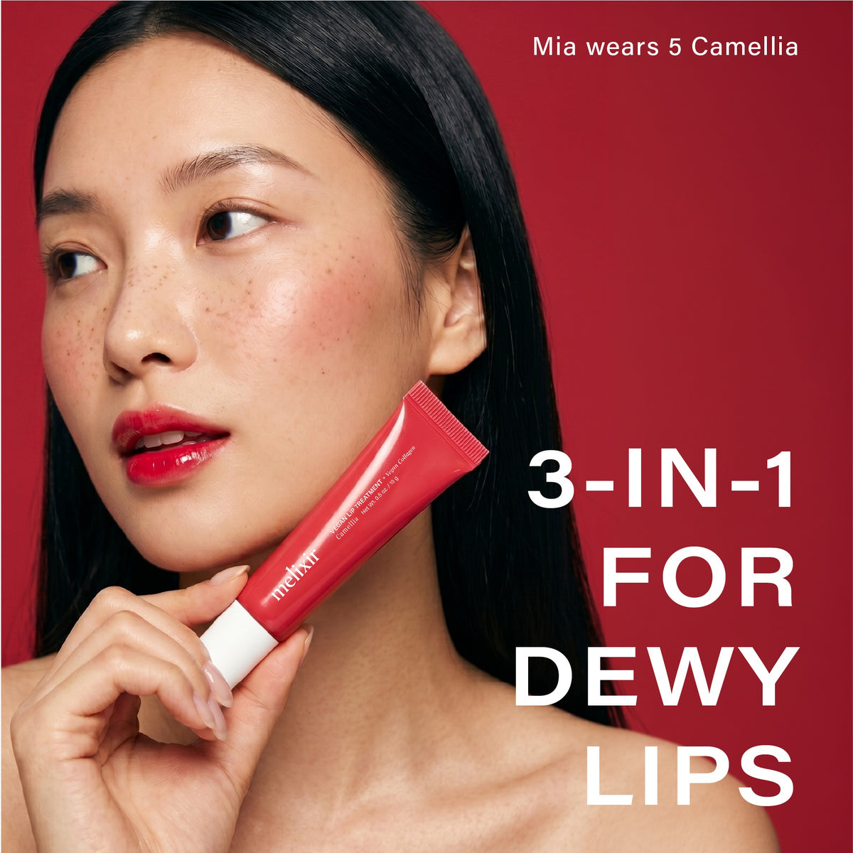 Melixir Vegan Lip Treatment 5 Camellia — model applying the lip treatment