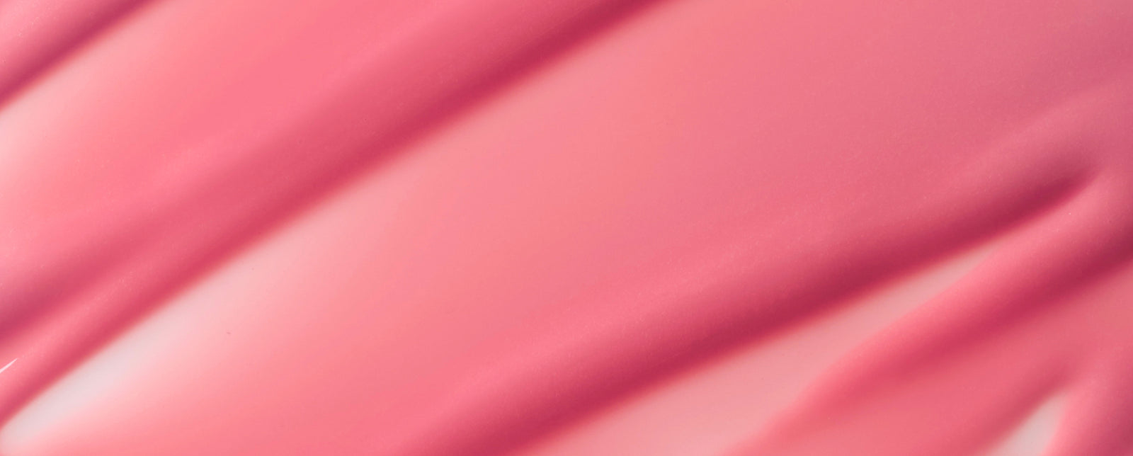 Pink lip treatment texture
